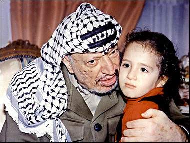 In this handout picture from the Palestinian Authority's archives, dated mid 1990s, Yasser Arafat is seen posing with his daughter Zahwa in Gaza City.(AFP/PPO-HO/File)